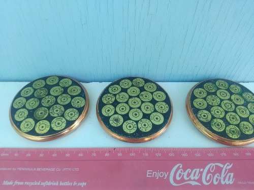 X3 COASTERS MADE OUT OF GUN SHELLS