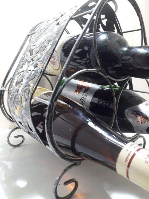 X1 WINE RACK UP FOR GRABS , HOLDS 3 BOTTLES !