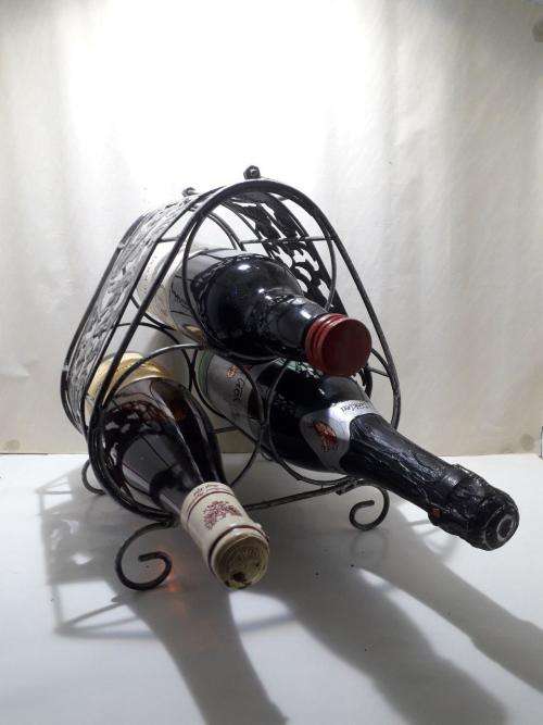 X1 WINE RACK UP FOR GRABS , HOLDS 3 BOTTLES !