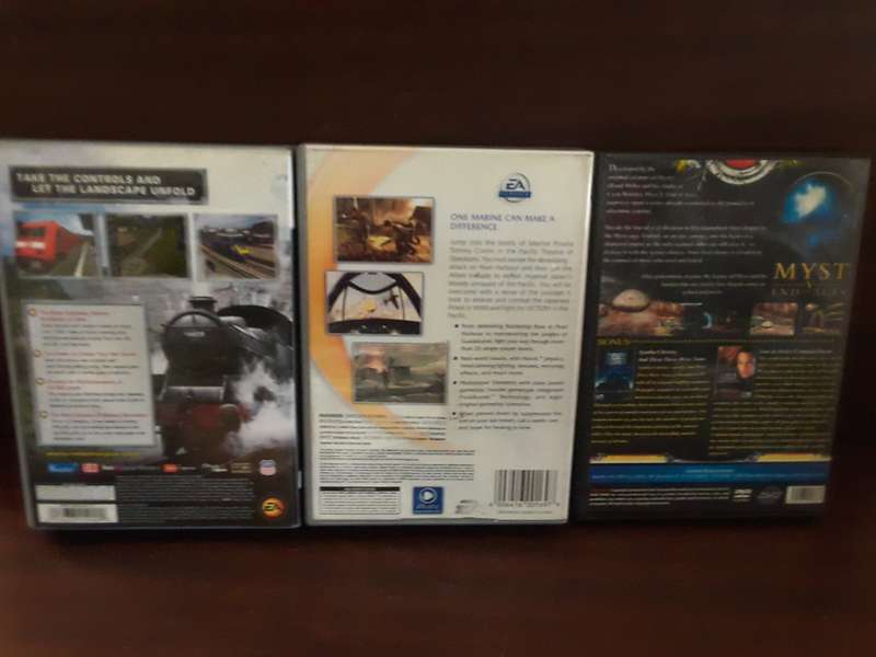 PC Games - Three games , Metal of Honor ,Rail Simulator , Myst v End of  Ages