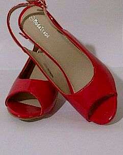 Stunning RED PATENT WEDGES R200.00