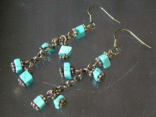 Turquoise chip stone in antique copper.