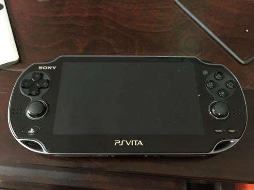 Sony psp vita WIFI mint condition used twice with one game and memory card +box