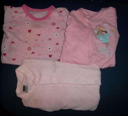 THREE PINK BABY GROWS