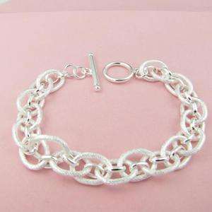 Silver Wide Mottled Oval Link Bracelet