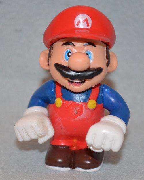 Mario from Super Mario Bros Nintendo (about 5.5cm)
