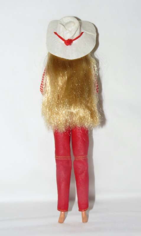 Mattel Barbie doll wearing most of Horse Lovin Barbie`s outfit