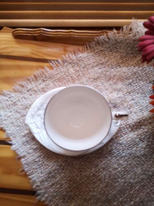 Highly Collectable Porcelain Teacup and Saucer with embossed detail and silver finishing