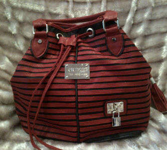 BRAND NEW!!!! RED DRAWSTRING BAG- A MUST HAVE!!!!!
