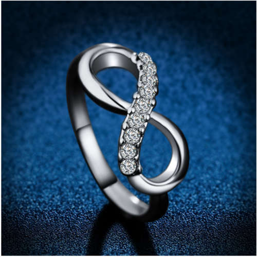 ASTOUNDING WHITE GOLD PLATED INFINITY RING WITH SIMULATED DIAMONDS SIZE 7/17.3MM/O