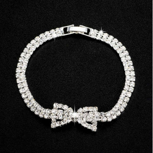 HEADTURNER!! WHITE GOLD PLATED SIMULATED DIAMOND BOW BRACELET