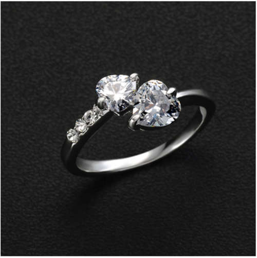 SENSATIONAL!! WHITE GOLD PLATED 2 HEART RING WITH SIMULATED DIAMOND SIZE 7/17.3MM/O
