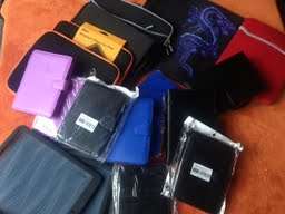 HUGE lot of IPad & Kindle covers! All for one bid.Start your own business see our other R1 auctions
