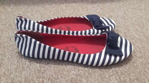 Navy and white pumps