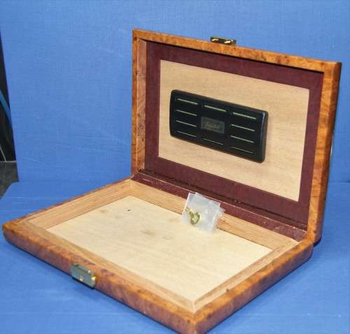 Leather and walnut Gentili cigar humidor.