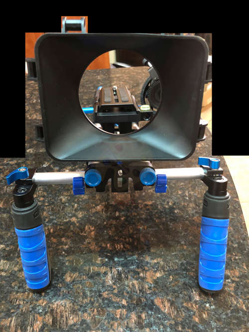 Shoulder rig for DSLR cameras.