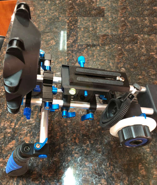 Shoulder rig for DSLR cameras.