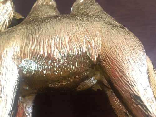 A Pair of Golden `World of Feng Shui` Camels