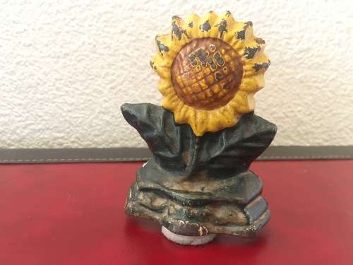 Vintage Sunflower Cast Iron Door Stop with Loads of Character