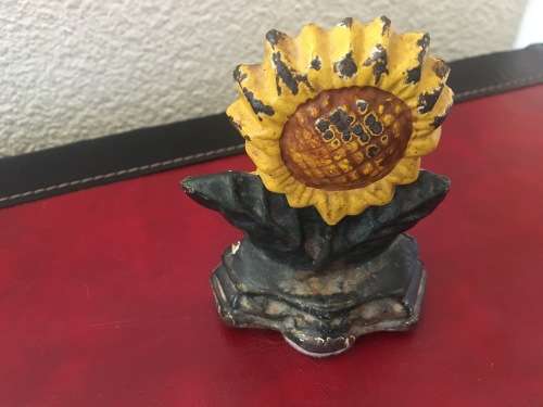 Vintage Sunflower Cast Iron Door Stop with Loads of Character