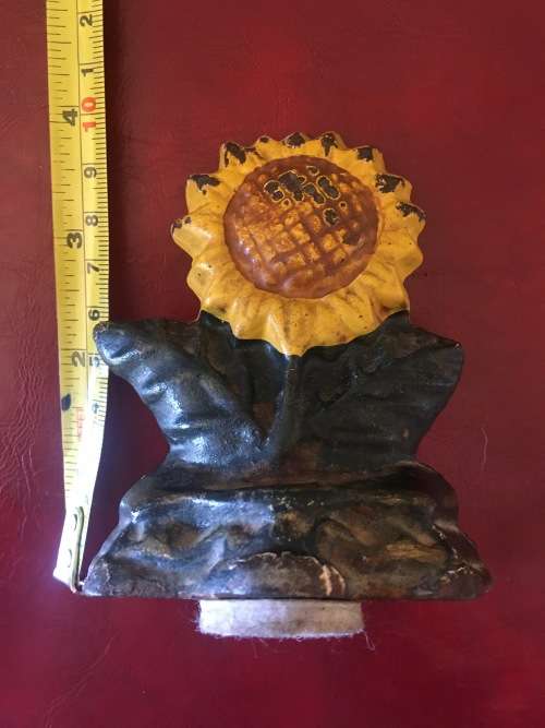 Vintage Sunflower Cast Iron Door Stop with Loads of Character