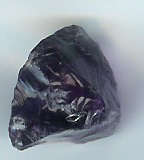 A RARE ROUGH UNCUT AND UNTREATED EYE CLEAN 30 .42 CT AMETHIST.12 MM X 13  MM X 12 MM.