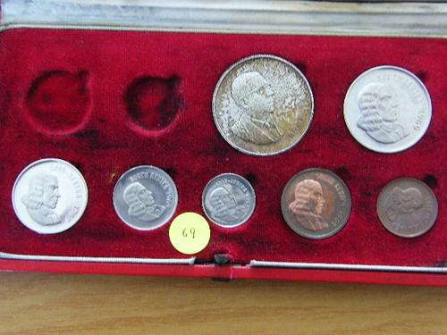A 1969 LONG PROOF SET WITHOUT THE GOLD IN A RED SAM CASE.