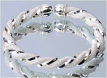 SILVER TONED TWISTED BANGLE - VERY BEAUTIFUL