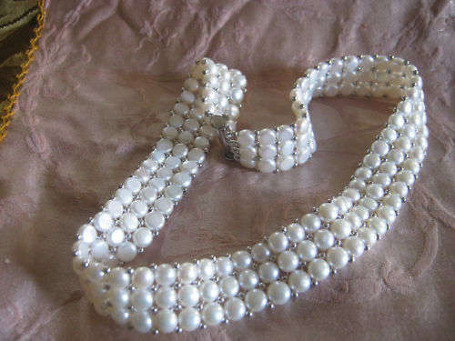 GENUINE FRESHWATER PEARLS BEAUTIFULLY CRAFTED INTO A VERY CLASSY CHOKER. LOVELY CLASP.