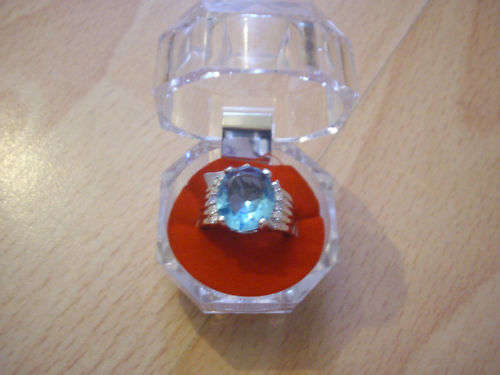 STUNNING AQUAMARINE cz RING IN SILVER PLATED BUT HALLMARKED
