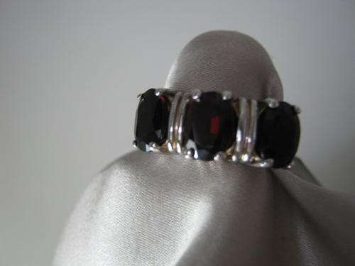 VERY WELL MADE ELECTROPLATED SILVER WITH CZ GARNETS DRESS RING