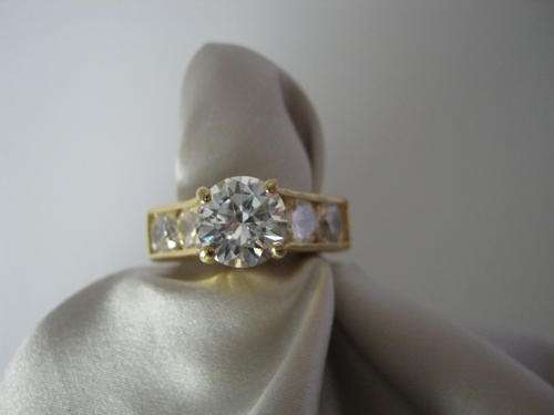 GOLD ELECTROPLATED WITH CZ SAPPHIRES.  Size 5