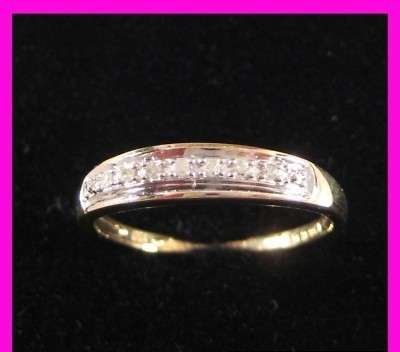 9ct gold diamond eternity ring with 7 genuine diamonds. Fully hallmarked