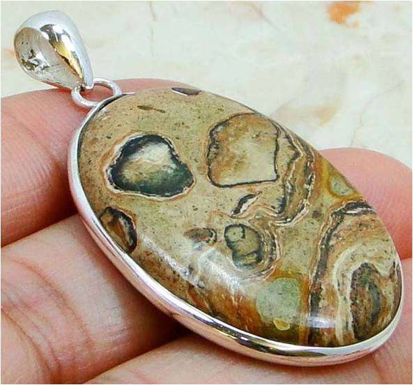 TRUE BEAUTY JASPER GEMSTONE INCASED IN GENUINE SILVER
