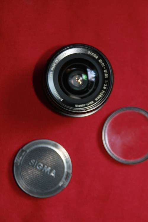 Sigma Mini-wide 1:2.8 28 mm for Nikkormat & Nikon F1-F3 bodies. Excellent condition. Case Included