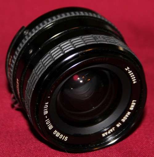 Sigma Mini-wide 1:2.8 28 mm for Nikkormat & Nikon F1-F3 bodies. Excellent condition. Case Included