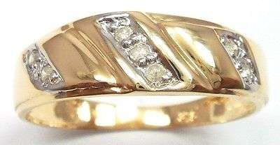 9CT SOLID YELLOW GOLD RING WITH 7 GENUINE DIAMONDS