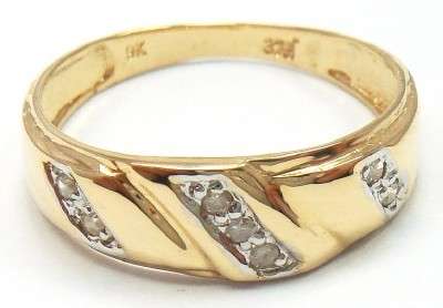 9CT SOLID YELLOW GOLD RING WITH 7 GENUINE DIAMONDS