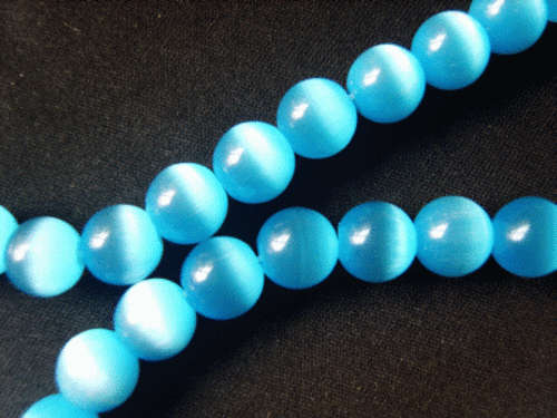Blue Cats Eye Rounds, 10mm - Per String (+/- 40 beads)