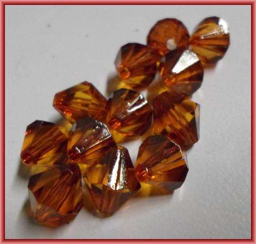Acrylic Amber Bicone,9mm - Pack of 20.