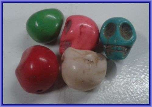 Dyed Turquoise Skulls, 12mm x 9mm - Pack of 5.