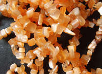 Carnelian Orange Catseye Chip String - Per 20cm Length.
