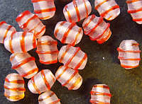 Orange Fancy Spiral Ovals , +/-  9mm X 6mm- Pack of 20.