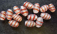 Brown Fancy Spiral Ovals , +/-  9mm X 6mm- Pack of 20.