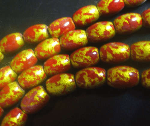 Red Marble Ovals 13mm x 9mm, 1 x String of 58 Beads.