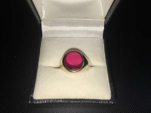 GENTS 9CT GOLD RING WITH PINK OVAL GEM