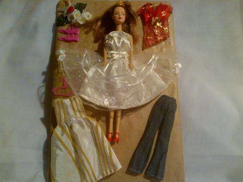 kiddies doll with clothing