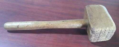 Well used wooden meat hammer
