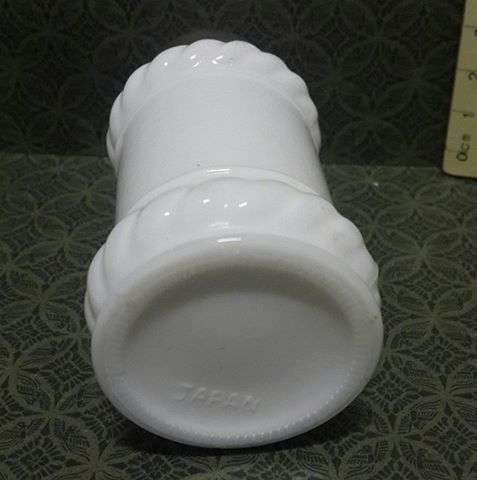Small milk glass bottle with cap
