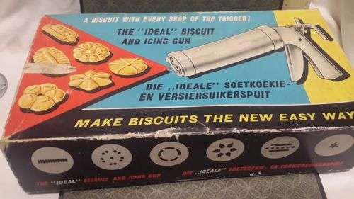 Boxed biscuit and icing gun! Look!